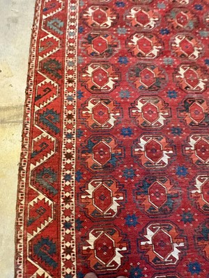Lot 422 - A large Tekke type carpet