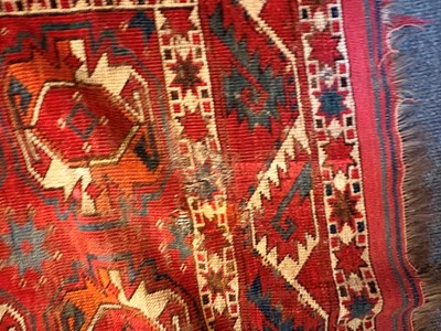 Lot 422 - A large Tekke type carpet