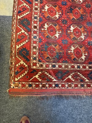 Lot 422 - A large Tekke type carpet