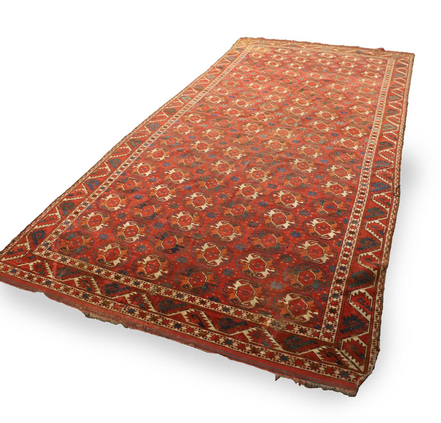 Lot 422 - A large Tekke type carpet