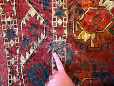 Lot 422 - A large Tekke type carpet