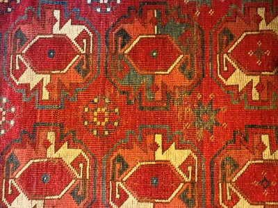 Lot 422 - A large Tekke type carpet