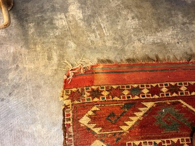 Lot 422 - A large Tekke type carpet