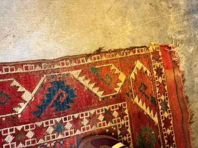 Lot 422 - A large Tekke type carpet
