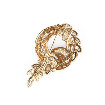 Lot 35 - A diamond scroll wreath design brooch