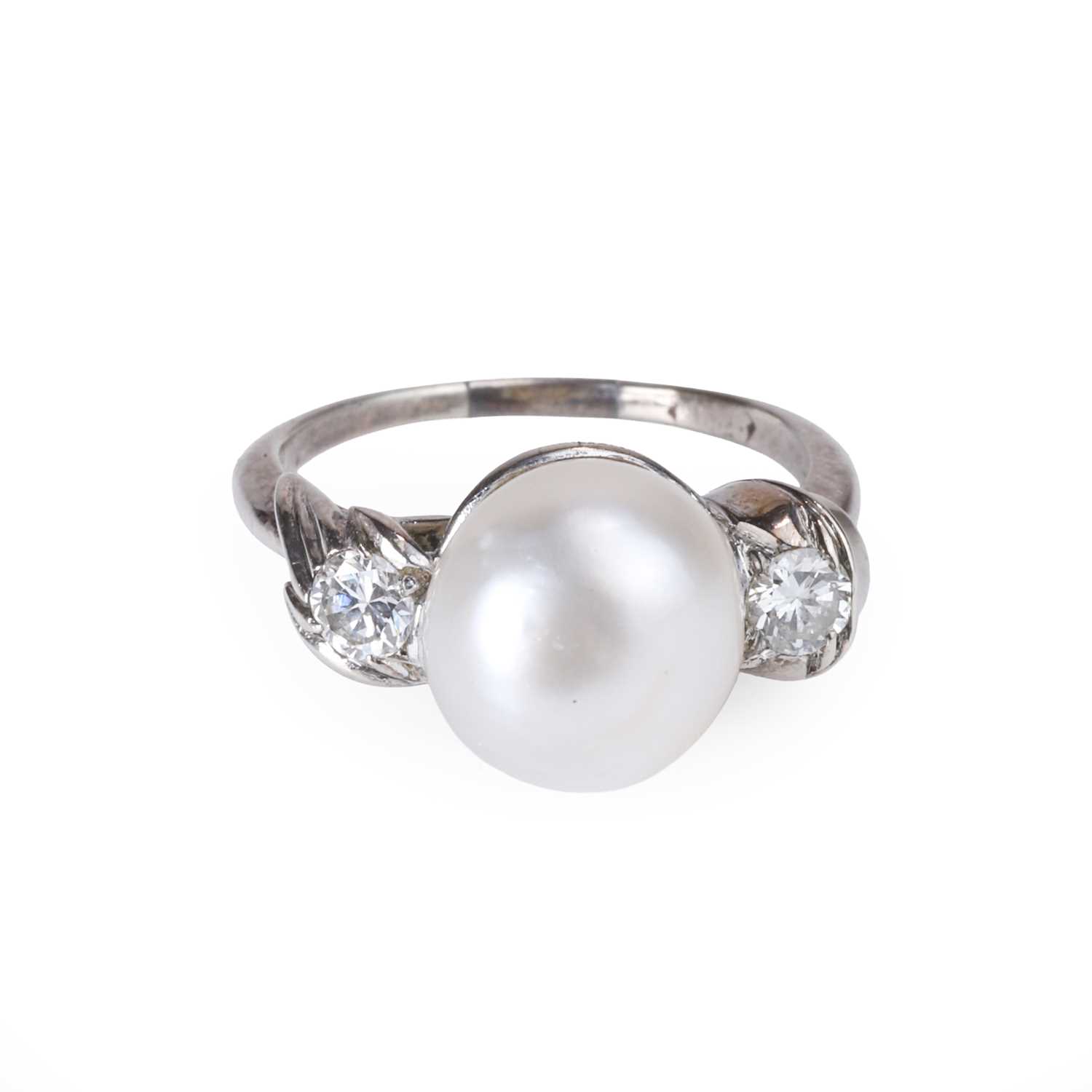 Lot 76 - A natural saltwater pearl and diamond ring