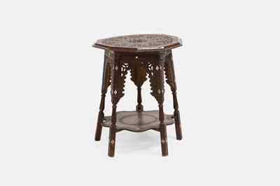 Lot 472 - A walnut and mother-of-pearl octagonal table
