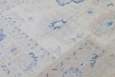 Lot 37 - An Oushak wool carpet