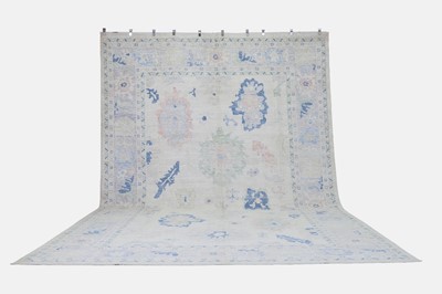 Lot 37 - An Oushak wool carpet