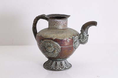 Lot 77 - A Tibetan brass teapot