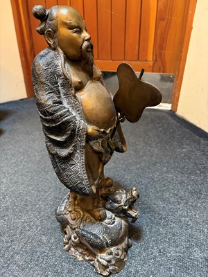 Lot 65 - A Chinese bronze figure of a sage