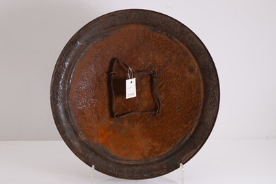 Lot 86 - An Indian copper-alloy decorative dhal shield