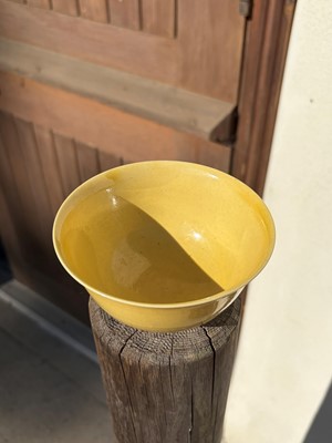 Lot 60 - A Chinese yellow glazed bowl