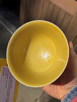Lot 60 - A Chinese yellow glazed bowl