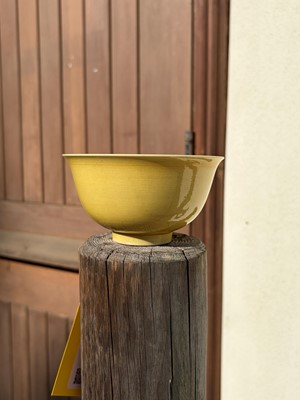 Lot 60 - A Chinese yellow glazed bowl