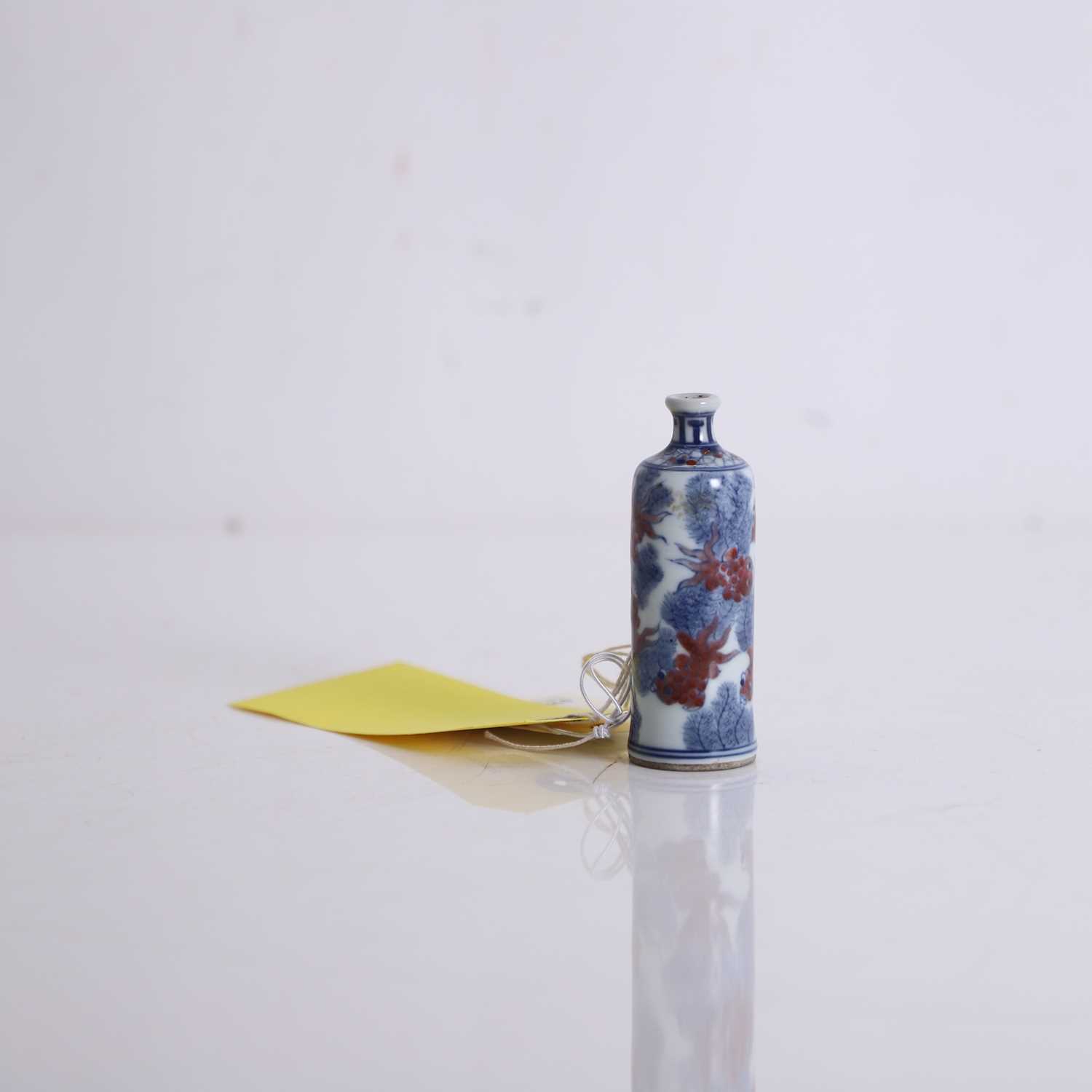 Lot 61 - A Chinese underglaze blue and red porcelain snuff bottle