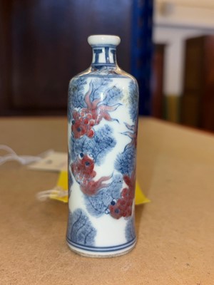 Lot 61 - A Chinese underglaze blue and red porcelain snuff bottle