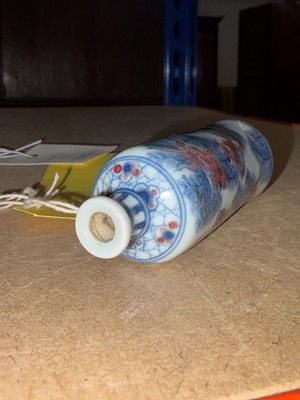 Lot 61 - A Chinese underglaze blue and red porcelain snuff bottle