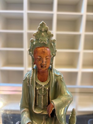 Lot 51 - A celadon glazed figure of Guanyin
