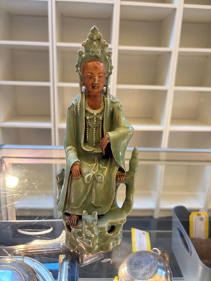 Lot 51 - A celadon glazed figure of Guanyin
