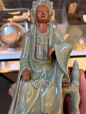 Lot 51 - A celadon glazed figure of Guanyin