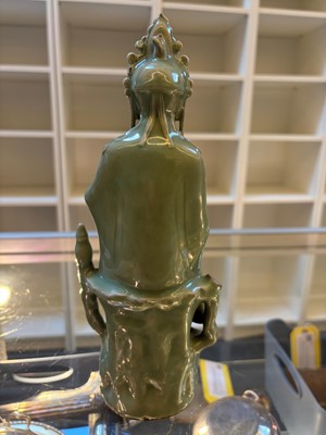 Lot 51 - A celadon glazed figure of Guanyin