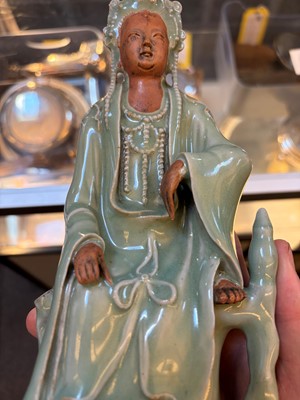 Lot 51 - A celadon glazed figure of Guanyin