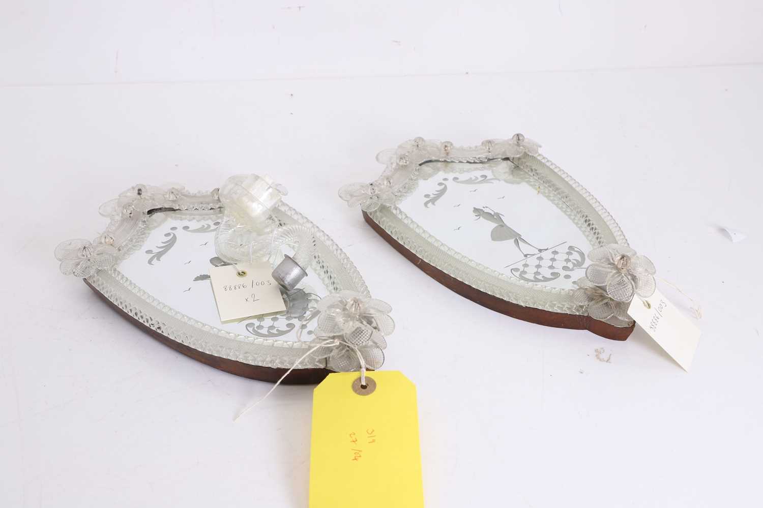Lot 319 - A pair of glass girandole mirrors