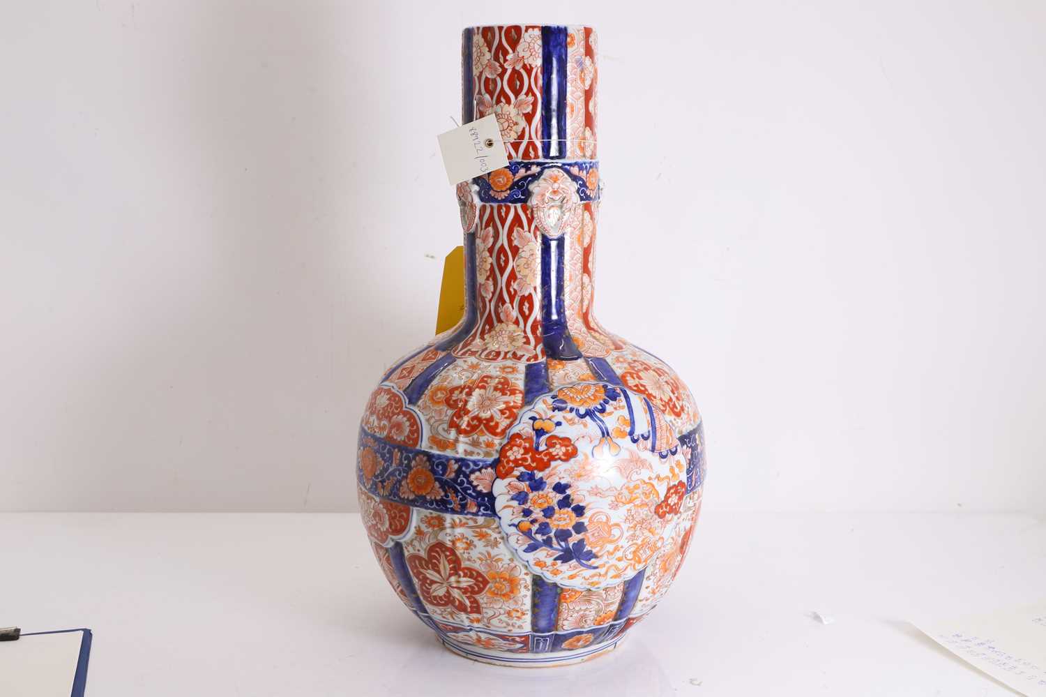Lot 76 - A large Japanese imari bottle vase