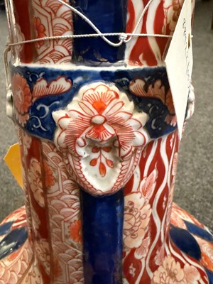 Lot 76 - A large Japanese imari bottle vase