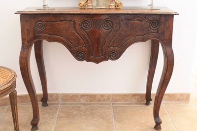 Lot 38 - A Louis XV oak console table