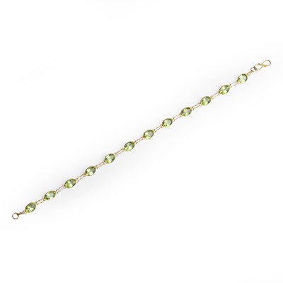 Lot 126 - A peridot set line bracelet