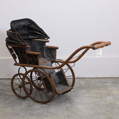 Lot 301 - A Victorian wood four-wheel perambulator