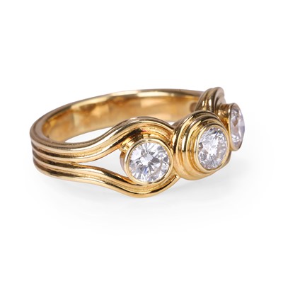 Lot 97 - An 18ct gold diamond three stone ring