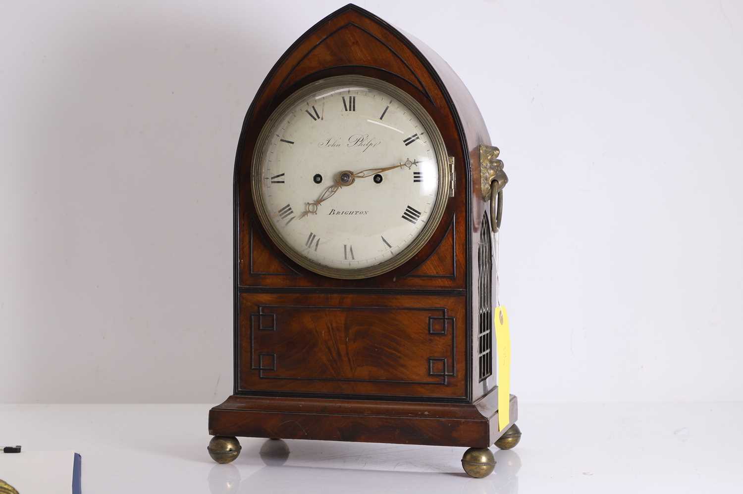 Lot 201 - A George IV mahogany lancet-shaped table clock by John Philip, Brighton