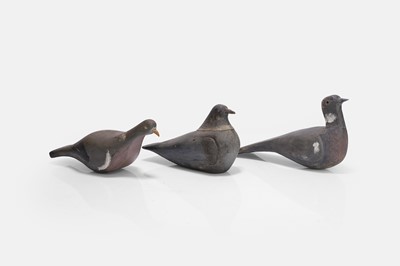 Lot 125 - A flight of three wooden decoy pigeons