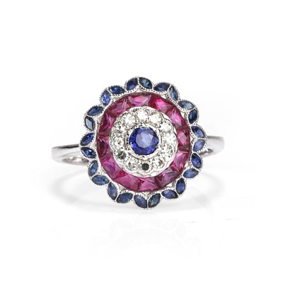 Lot 142 - A diamond and gemstone set target cluster ring