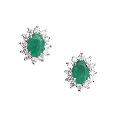 Lot 147 - A pair of emerald and diamond cluster stud earrings