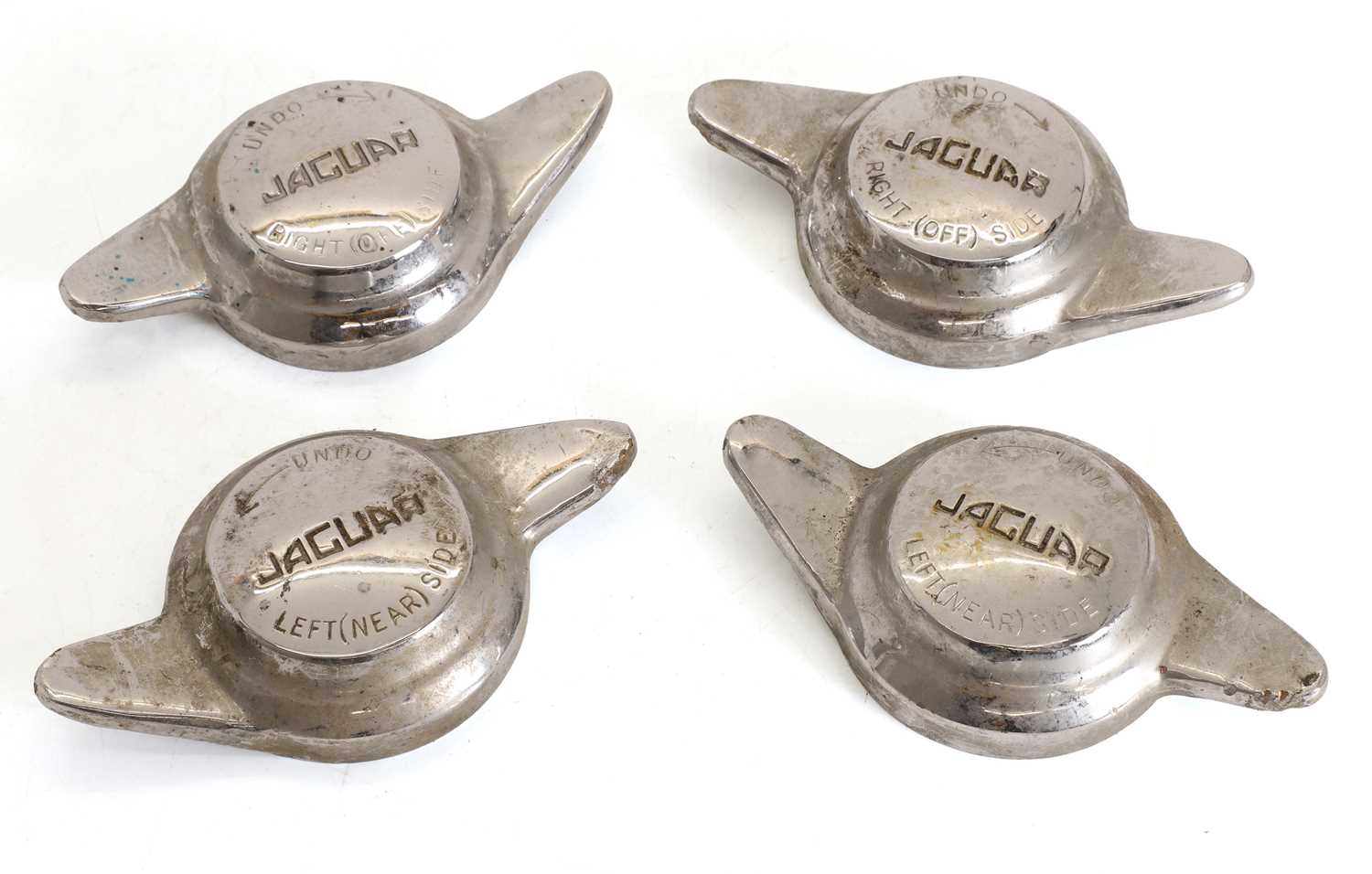 Lot 14 - A set of four matching Jaguar knock-off spinners