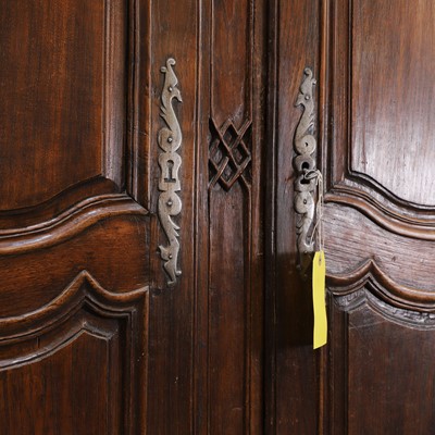 Lot 513 - A French provincial walnut armoire