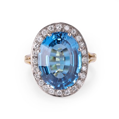 Lot 84 - A blue topaz and diamond cluster ring