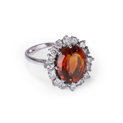 Lot 94 - A citrine and diamond cluster ring