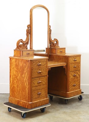 Lot 534 - A Victorian satin birch dressing table
