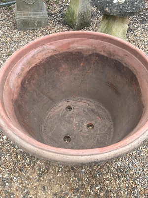 Lot 567 - A large terracotta planter
