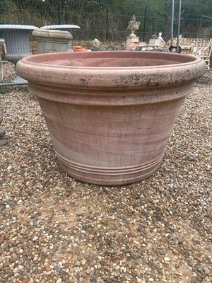 Lot 567 - A large terracotta planter