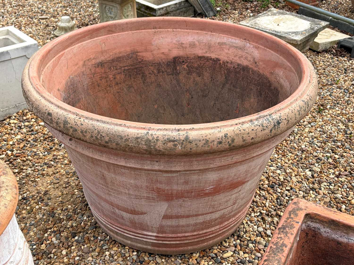 Lot 567 - A large terracotta planter