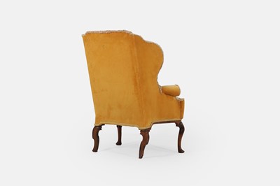 Lot 216 - A George I upholstered wing armchair