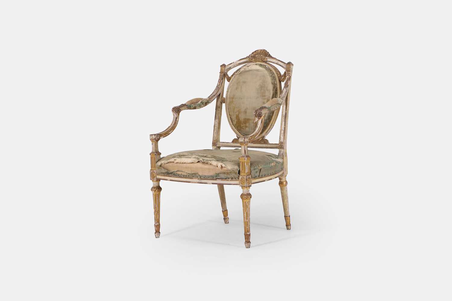 Lot 230 - A Louis XVI-style painted and gilded beech armchair