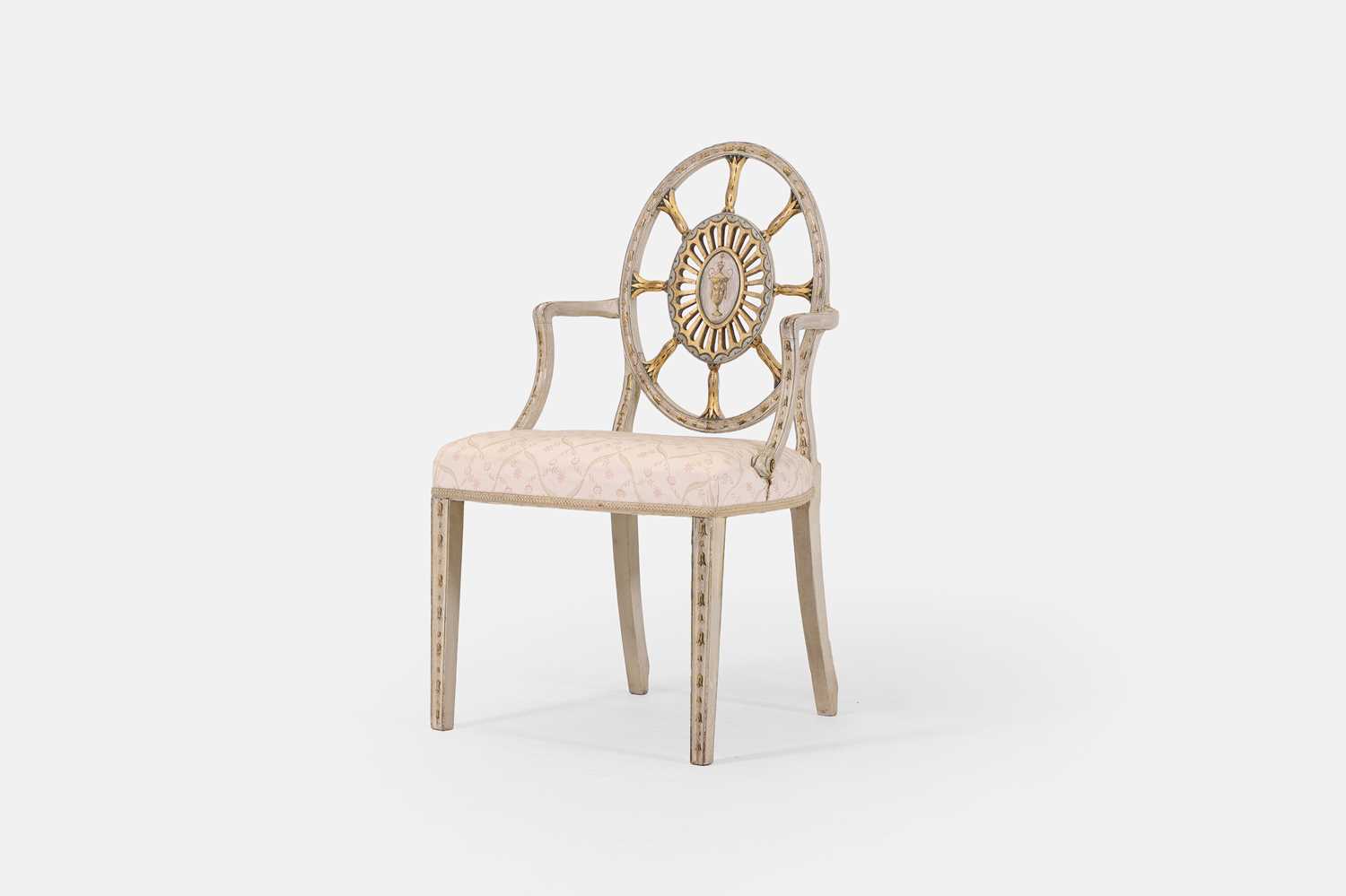 Lot 234 - A George III painted and parcel-gilt wooden armchair