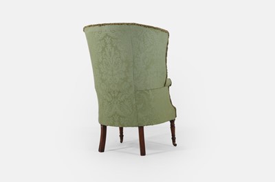 Lot 241 - A Regency upholstered wing armchair